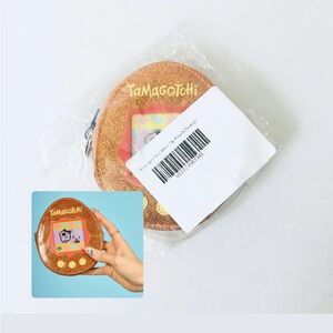 Cakeworthy X Tamagotchi Orange Glitter Zip Pouch